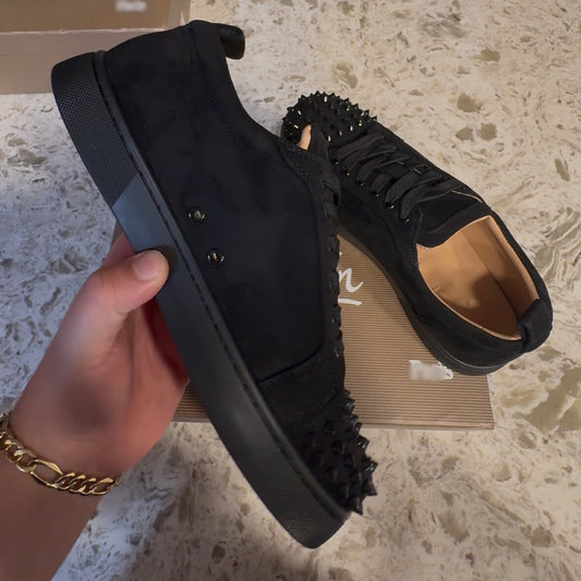 Red Bottoms spikes